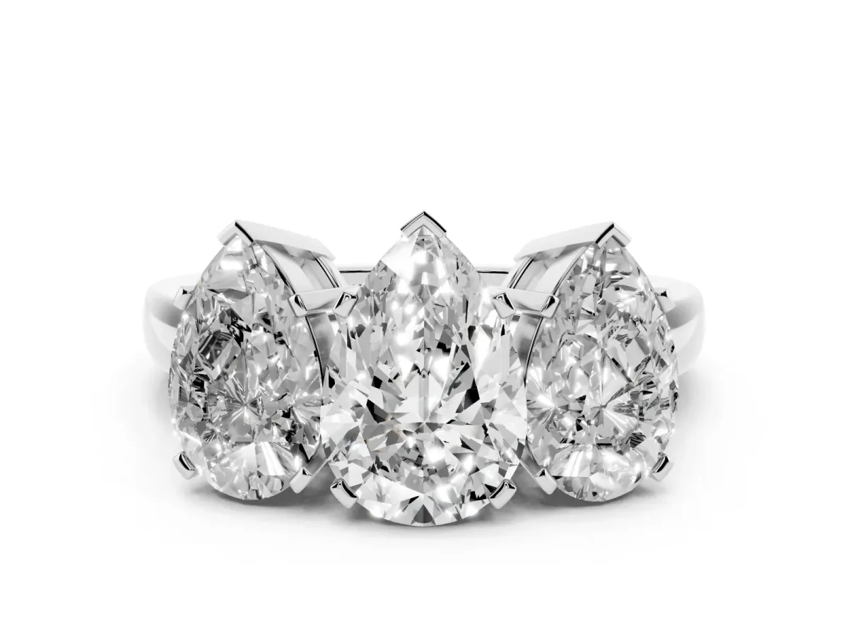Three-Stone Pear Cut Cut Diamond Ring with Channel Set Band and Four-Prong Setting Platinum