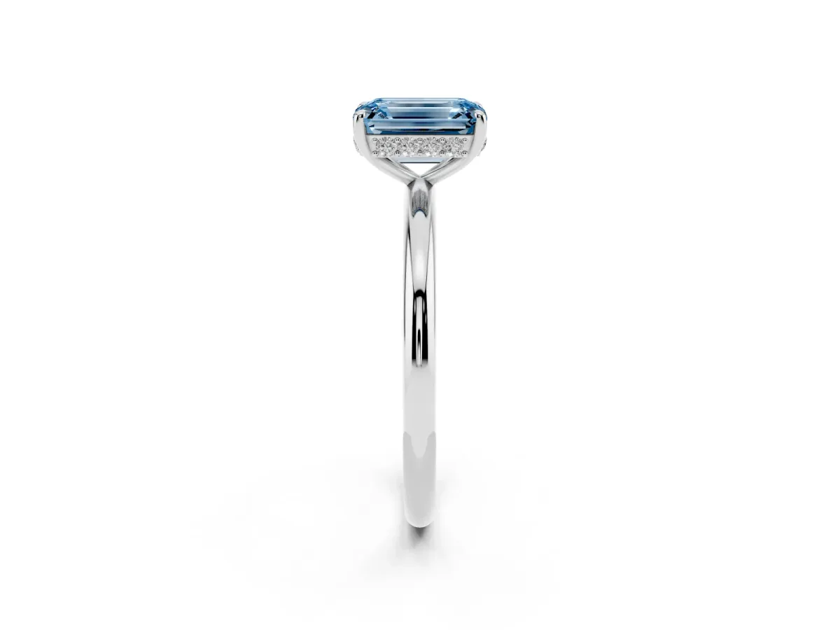 Fancy Blue Emerald Cut Solitaire Diamond Ring with a Classic Band and Four-Prong Setting Platinum