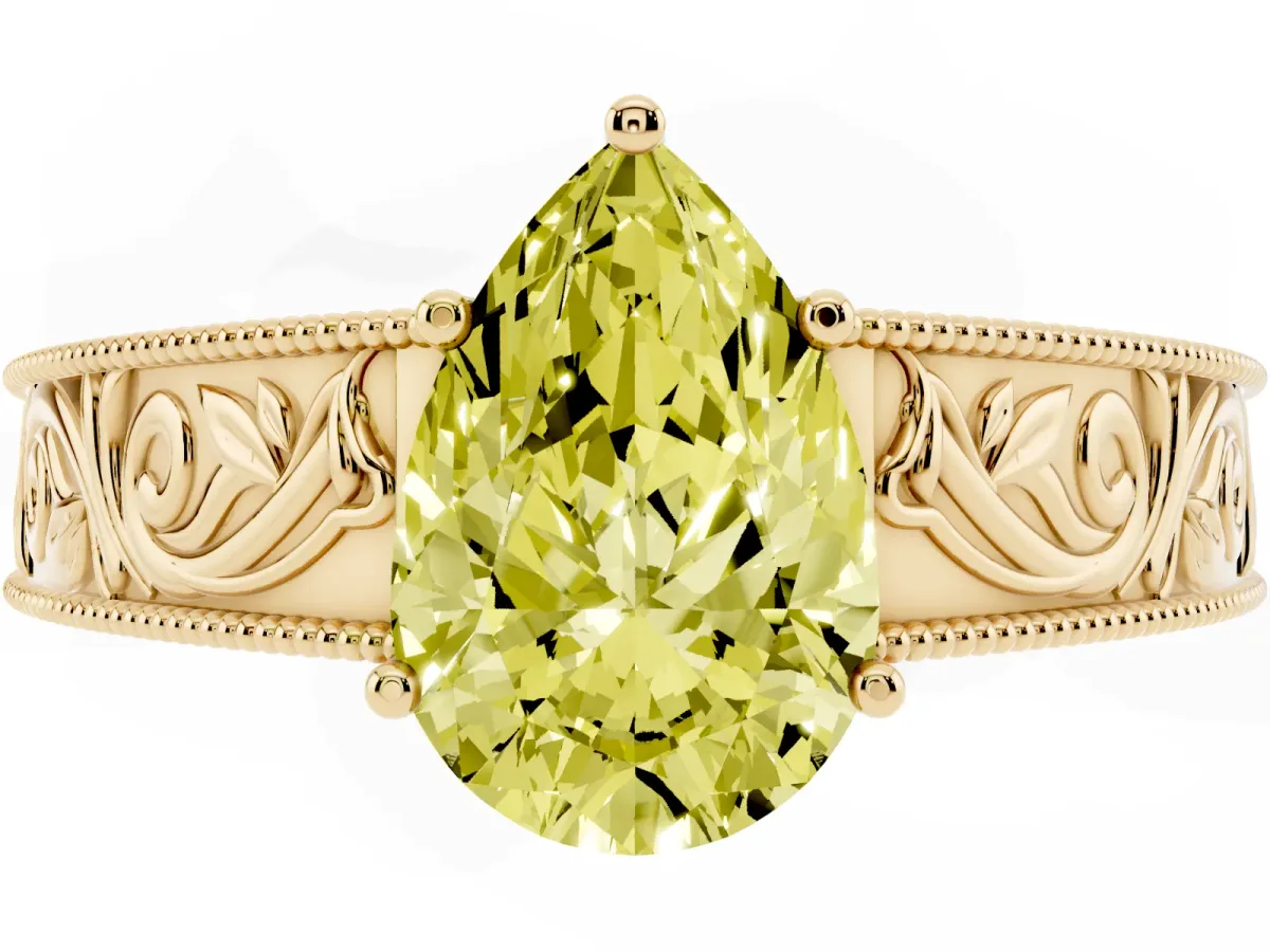 Fancy Yellow Pear Cut Diamond Solitaire Ring with Engraved Band and Four-Prong Setting Yellow gold