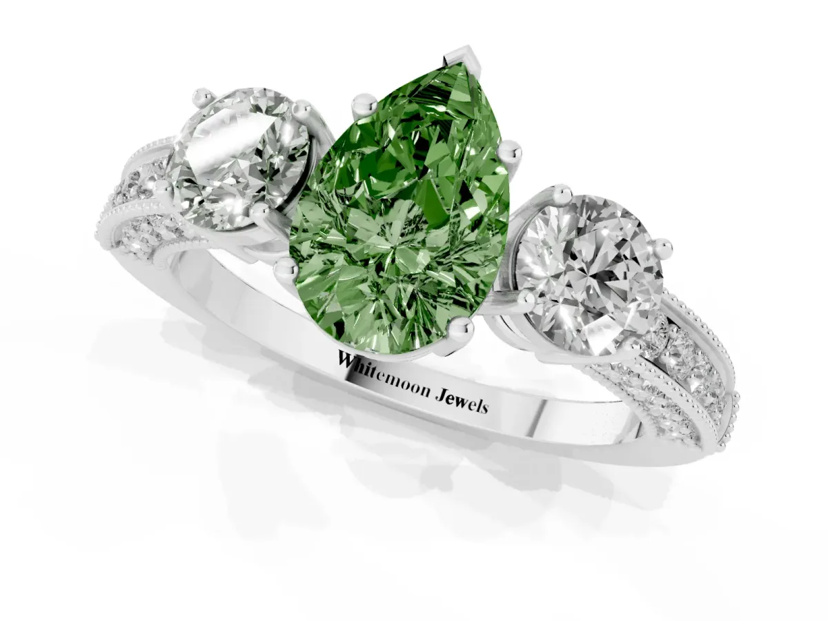Fancy Green Pear Cut Three-Stone Diamond Ring with Pavé Band and Four-Prong Setting Silver