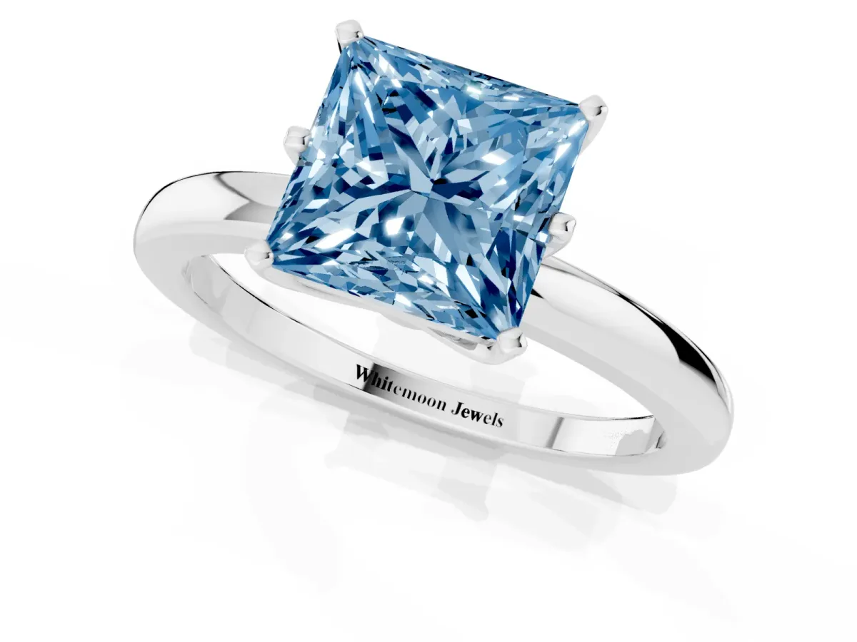 Fancy Blue Princess Cut Solitaire Diamond Ring with Six-Prong Setting on a Classic Band Silver