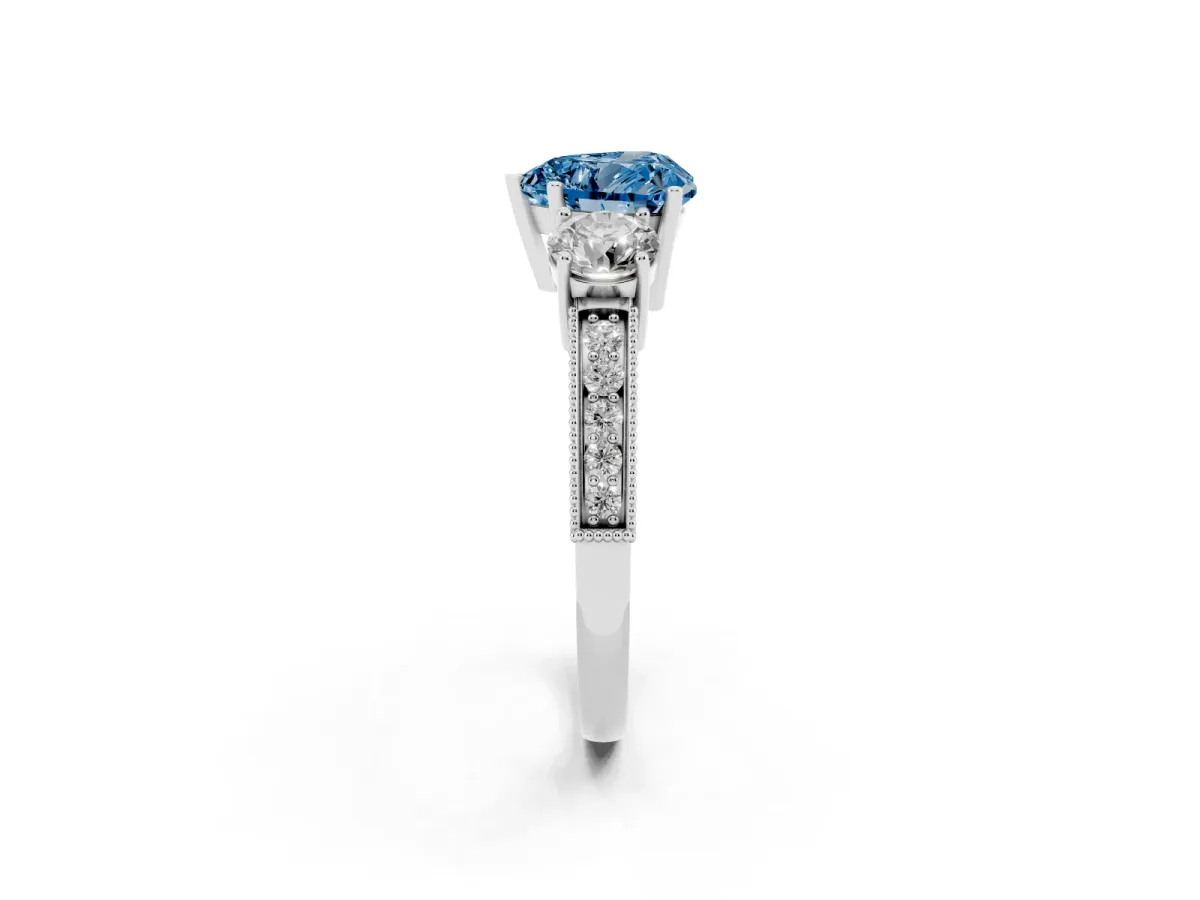 Fancy Blue Heart Cut Three-Stone Diamond Ring with Pavé Band and Four-Prong Setting Silver