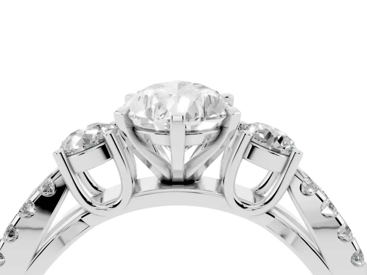 Pear Cut Diamond Three-Stone Ring with Pavé Split Shank and Four-Prong Setting Platinum