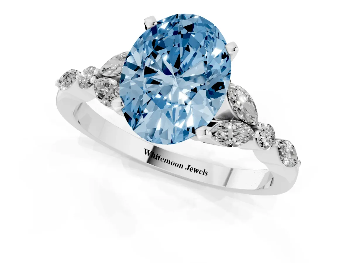 Fancy Blue Oval Cut Diamond Solitaire Ring with Side Stones and Four-Prong Setting Silver