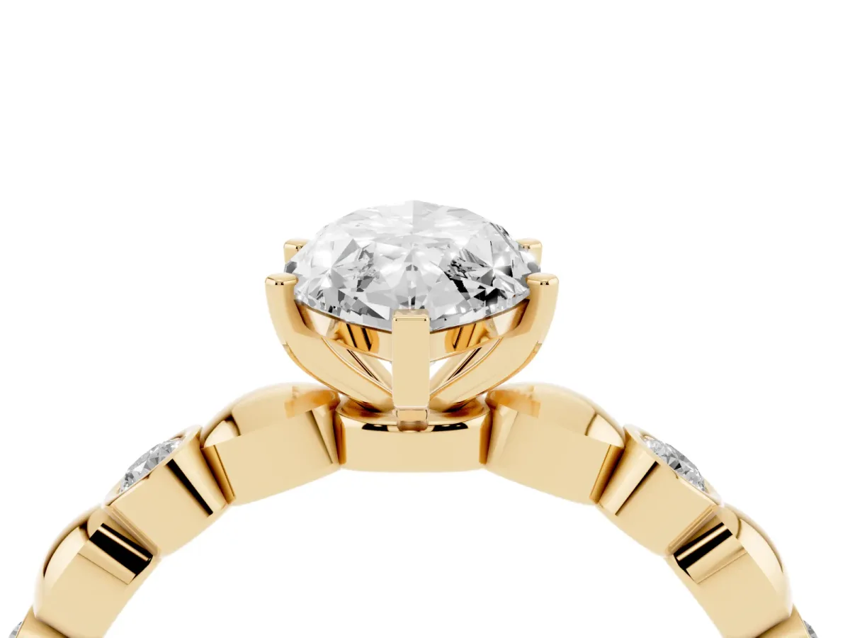 Marquise Cut Solitaire Bezel-Set Diamond Ring with Beaded Band and Four-Prong Setting Yellow gold