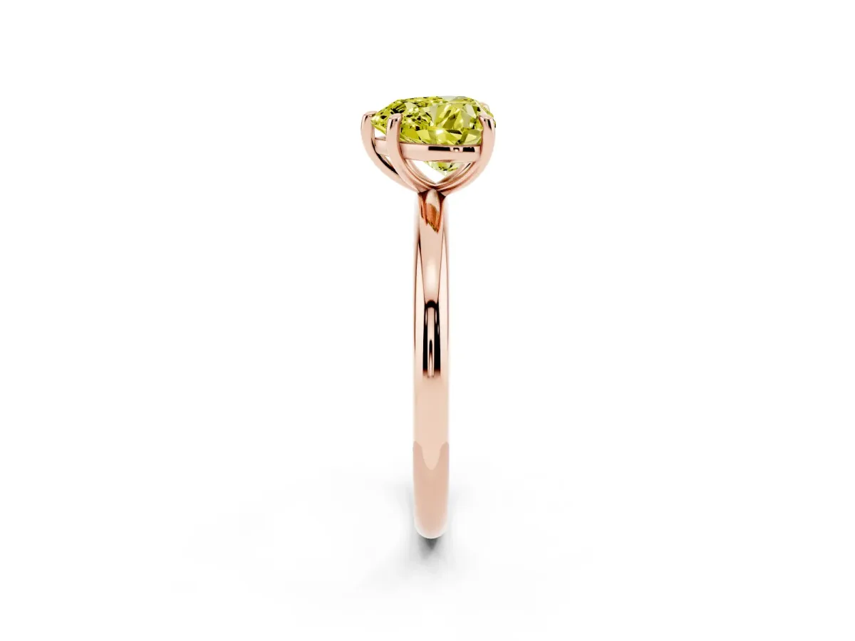 Fancy Yellow Heart Cut Solitaire Diamond Ring with Four-Prong Setting on a Plain Band Rose gold