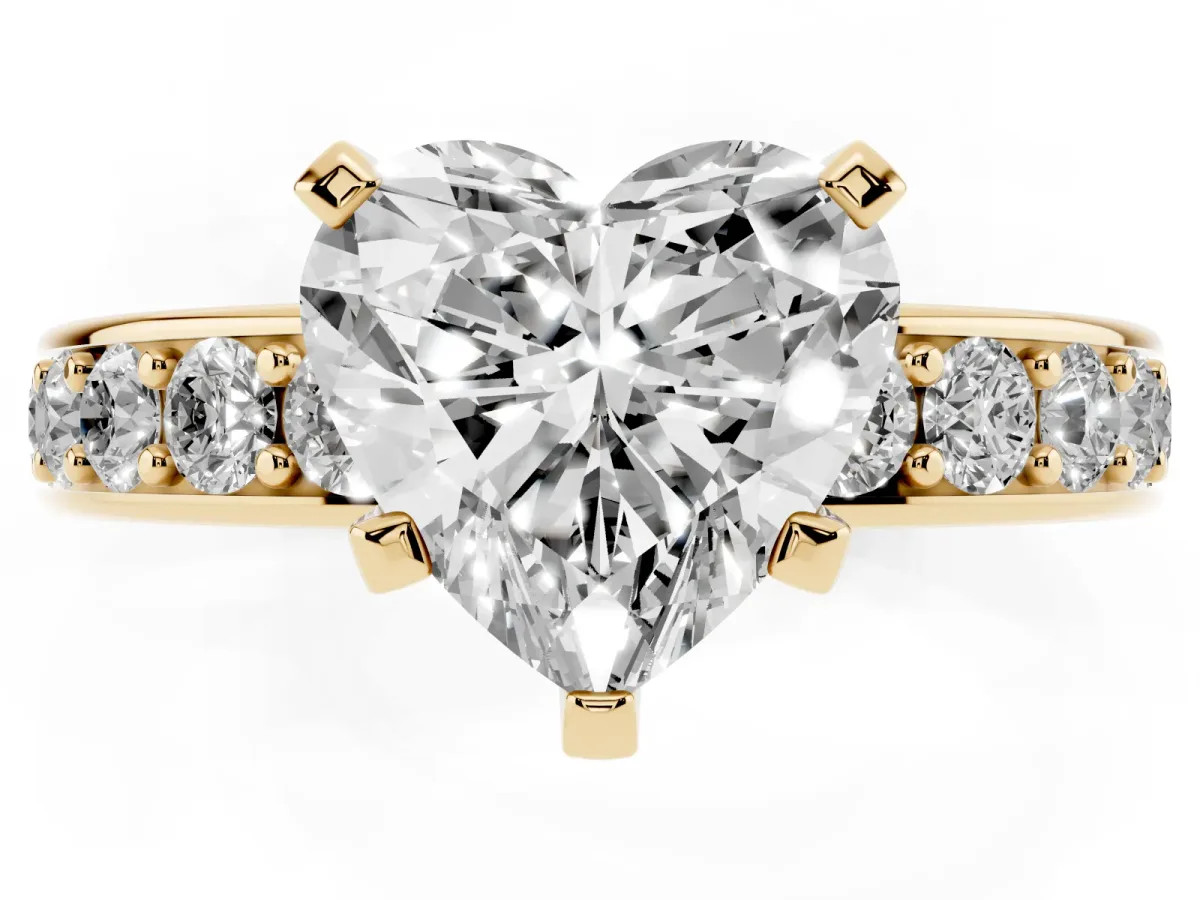 Heart Cut Diamond Engagement Ring with Channel Set Round Band and Prong Setting Yellow gold