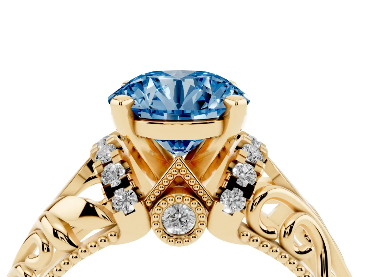 Fancy Blue Round Cut Solitaire Filigree Engagement Ring with Halo and Prong Setting Yellow gold