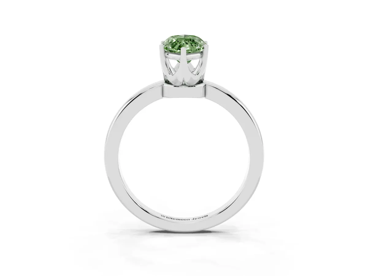 Fancy Green Marquise Cut Solitaire Diamond Ring with Six-Prong Setting on a Classic Band Silver