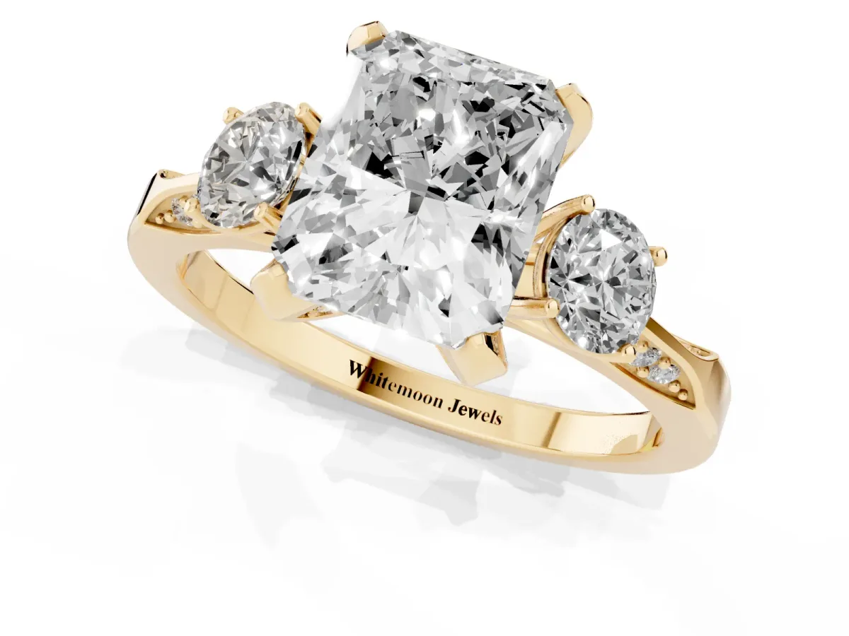 Radiant Cut Brilliant Three-Stone Diamond Ring with Pavé Band and Four-Prong Setting Yellow gold