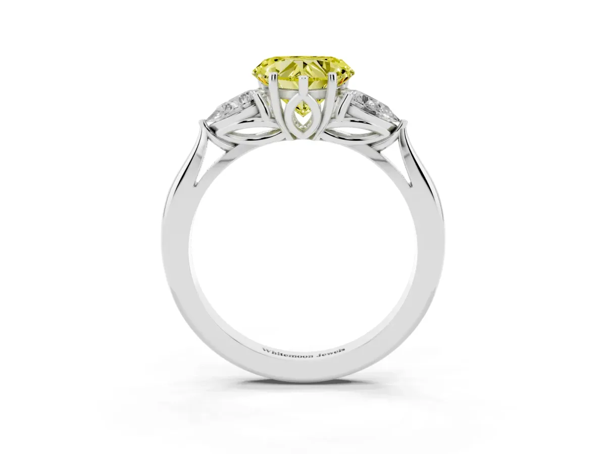 Fancy Yellow Three-Stone Heart Cut Diamond Ring with Pear Side Stones in Four-Prong Setting Silver