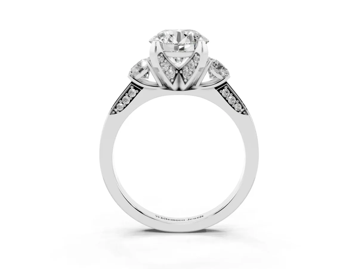 Round Cut Brilliant Three-Stone Diamond Ring with Pavé Band and Four-Prong Setting Silver