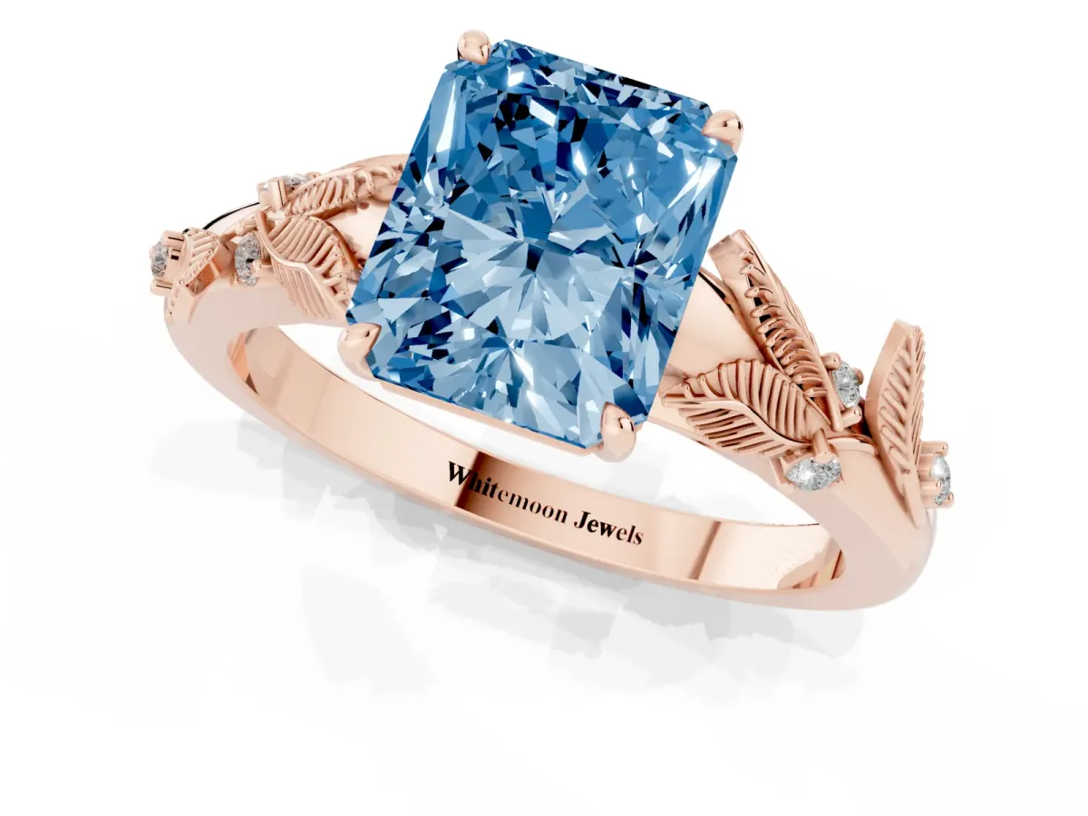 Fancy Blue Radiant Cut Diamond Solitaire Ring with Leaf Motif Band and Four-Prong Setting Rose gold