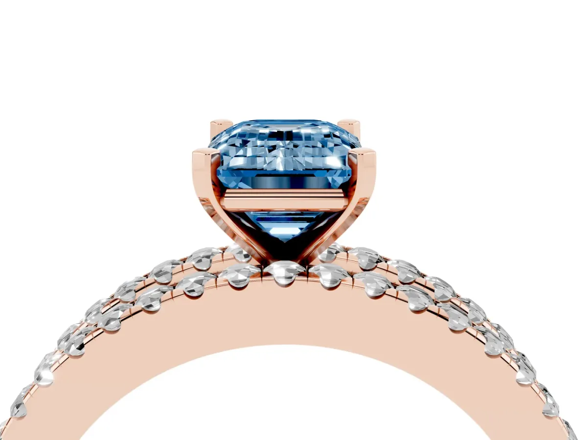 Fancy Blue Emerald Cut Diamond Solitaire Ring with Pavé and Channel Set Band Rose gold