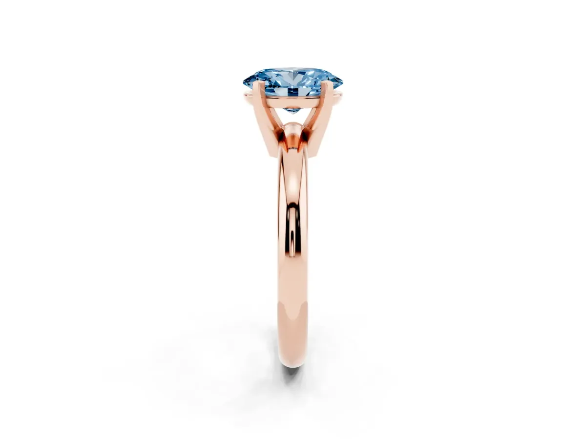 Fancy Blue Oval Cut Diamond Solitaire Engagement Ring with Round Band and Four-Prong Setting Rose gold
