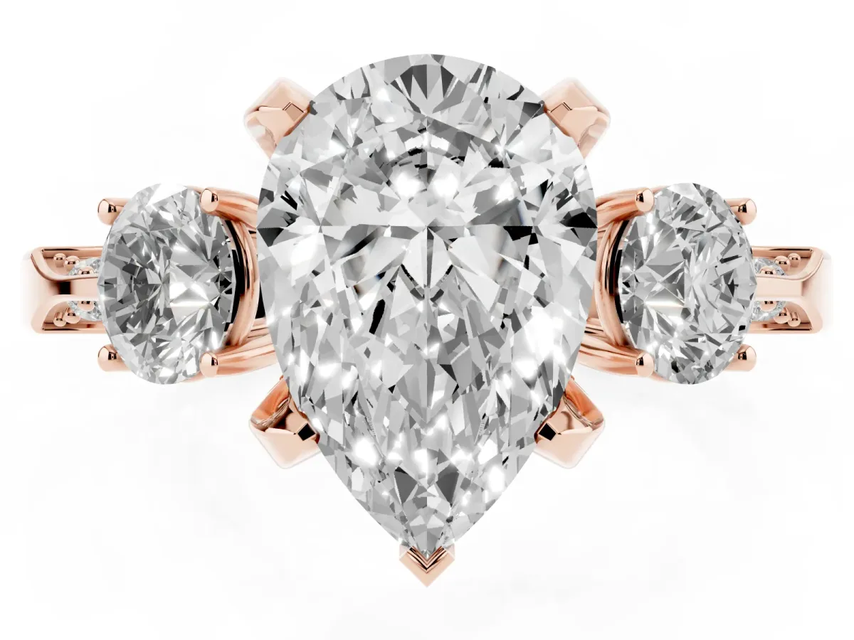 Pear Cut Brilliant Three-Stone Diamond Ring with Pavé Band and Four-Prong Setting Rose gold