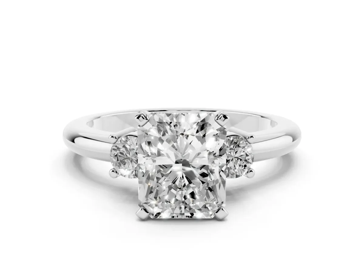 Three-Stone Radiant Cut Cut Diamond Solitaire with Prong Setting and Classic Band Silver