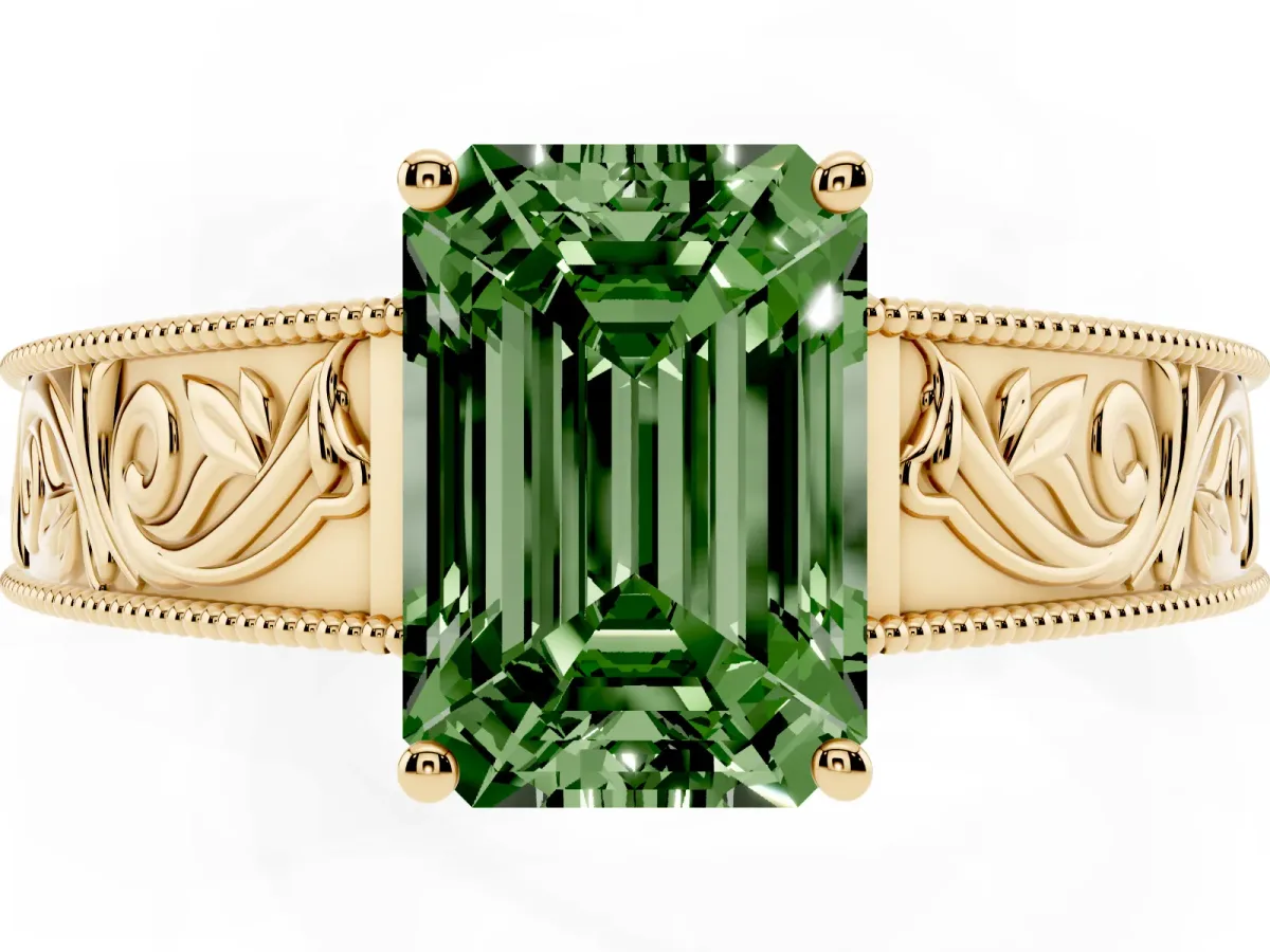 Fancy Green Emerald Cut Diamond Solitaire Ring with Engraved Band and Four-Prong Setting Yellow gold