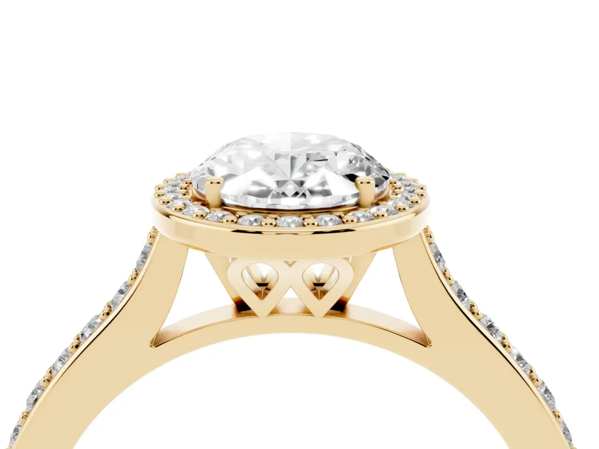 Oval Cut Diamond Halo Engagement Ring with Round Pavé Shoulders and Prong Setting Yellow gold