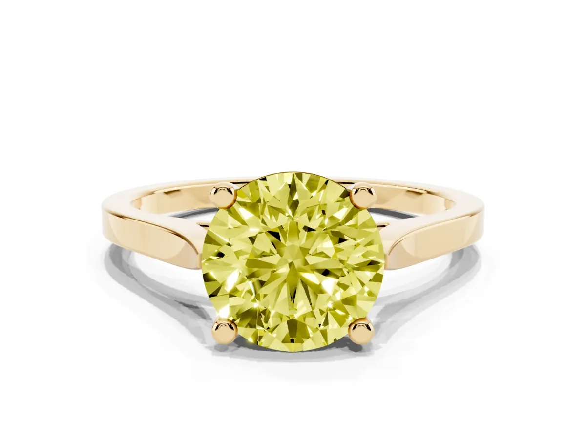 Fancy Yellow Round Cut Solitaire Diamond Ring with Four-Prong Setting and Tapered Band Yellow gold
