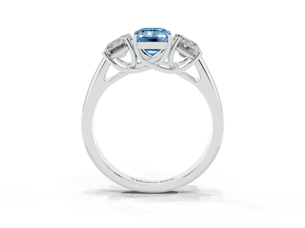 Fancy Blue Three-Stone Emerald Cut Diamond Engagement Ring with Prong Setting Silver