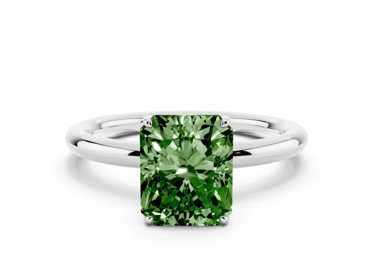 Fancy Green Radiant Cut Solitaire Diamond Ring with Four-Prong Setting on a Plain Band Platinum
