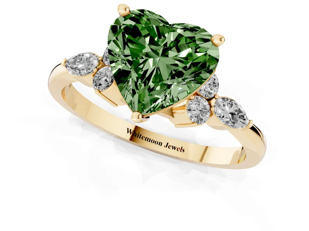 Fancy Green Heart Cut Brilliant Diamond Solitaire Ring with Pear Side Stones and Four-Prong Setting Yellow gold