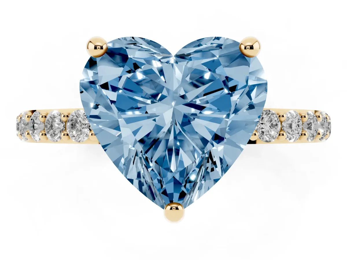 Fancy Blue Heart Cut Diamond Solitaire Ring with Round Pavé Band and Prong Setting Yellow gold