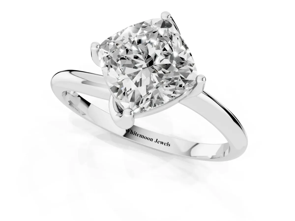 Cushion Cut Diamond Solitaire Engagement Ring with Four-Prong Setting and Classic Band Silver