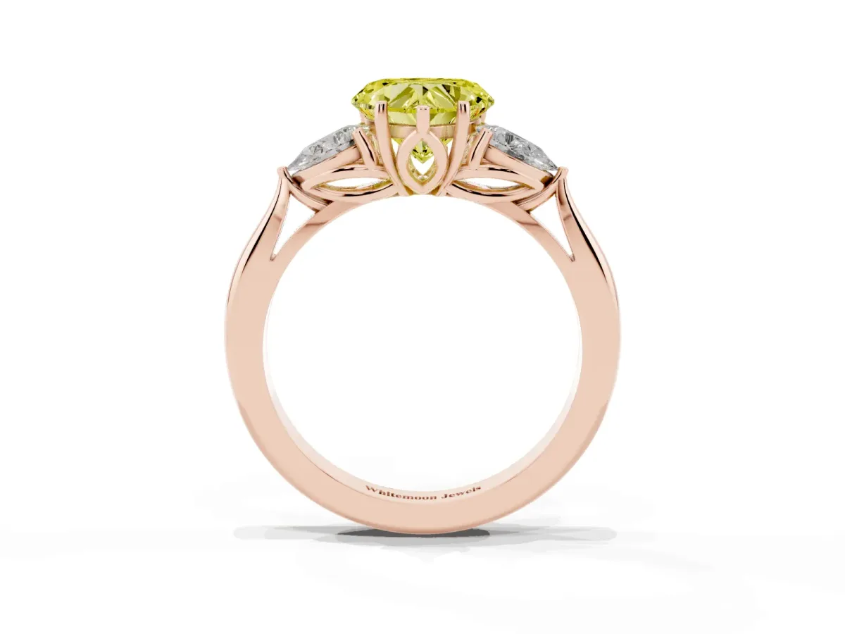 Fancy Yellow Three-Stone Heart Cut Brilliant Diamond Solitaire Ring with Tapered Band and Four-Prong Setting Rose gold