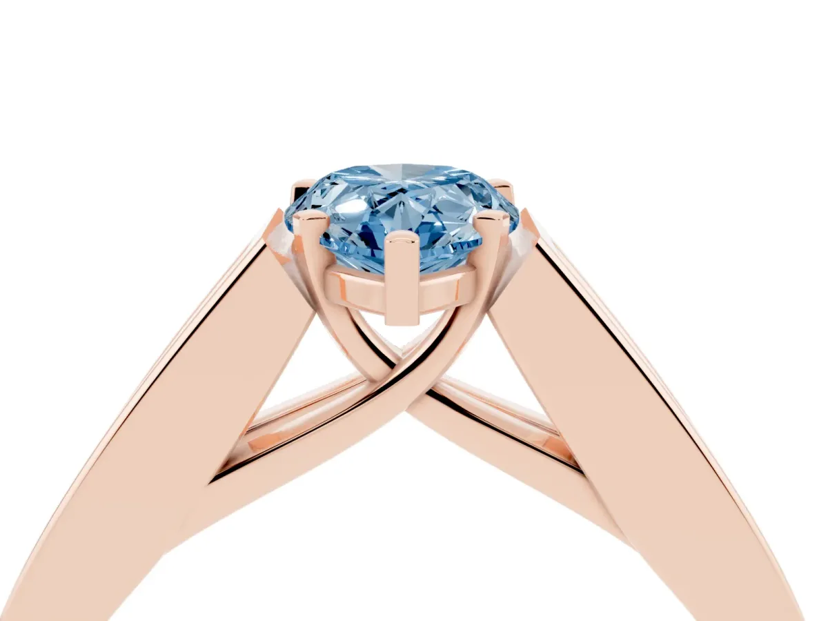Fancy Blue Pear Cut Cut Channel Set Solitaire Ring with Four-Prong Setting Rose gold
