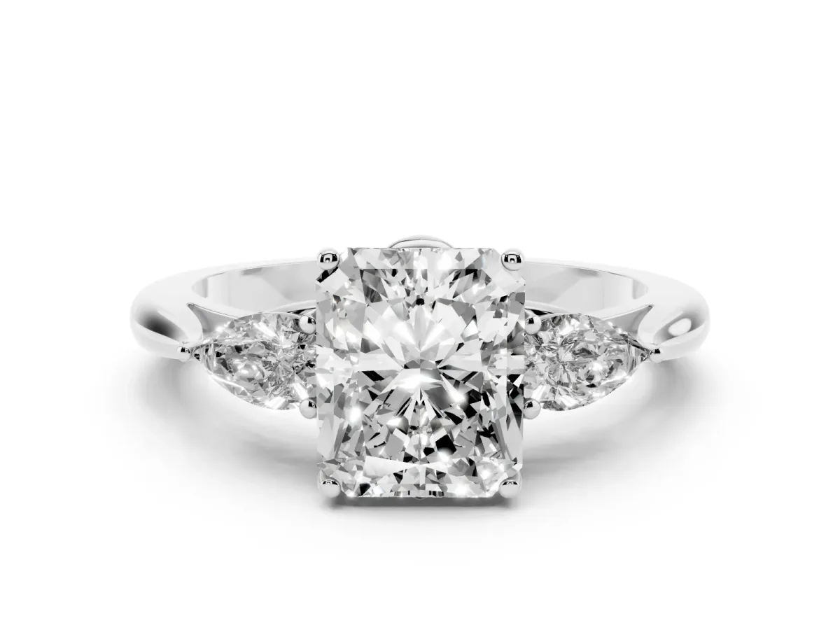 Three-Stone Radiant Cut Diamond Ring with Pear Side Stones in Four-Prong Setting Silver