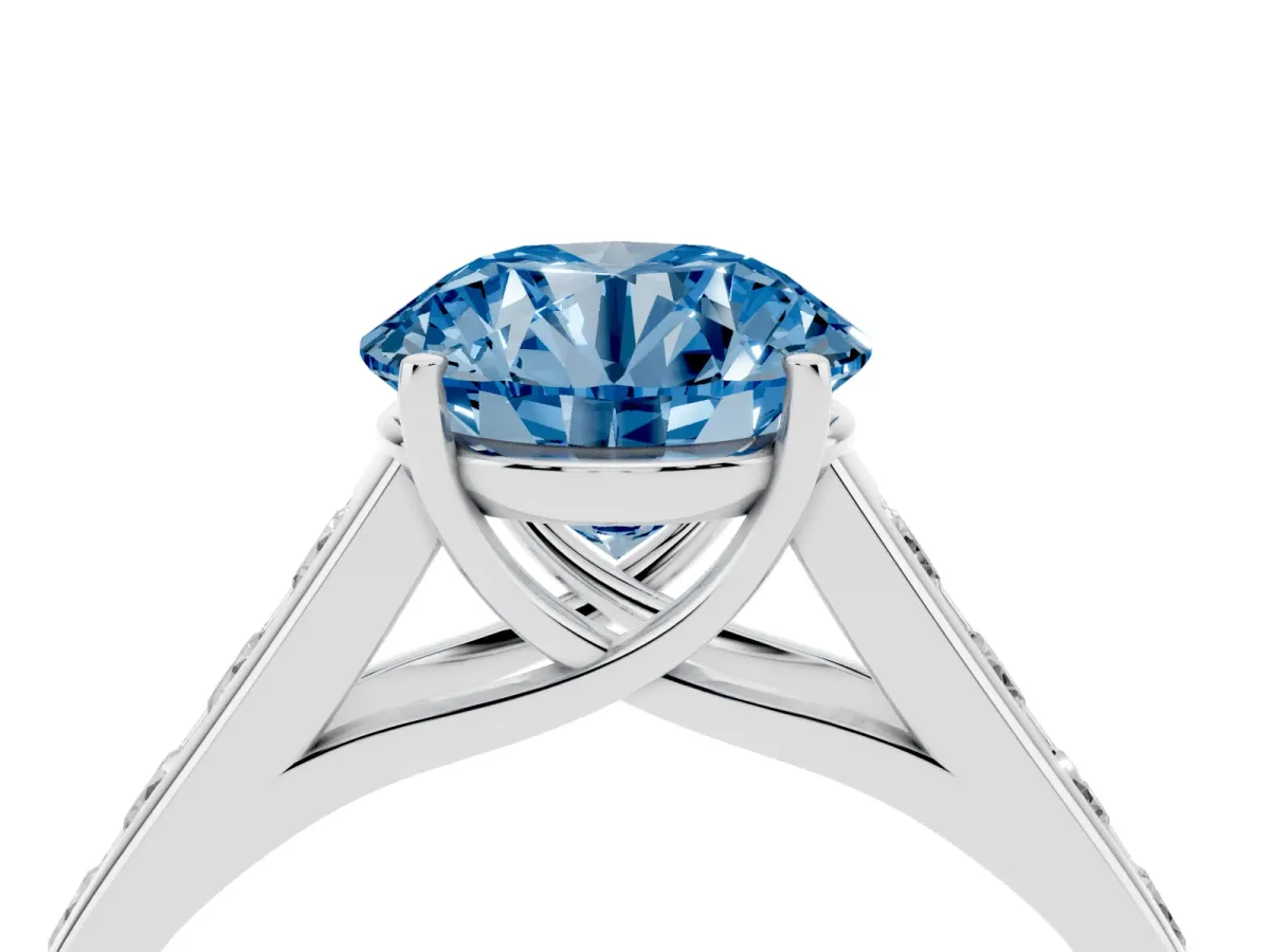 Fancy Blue Round Cut Brilliant Channel-Set Solitaire Ring with Four-Prong Setting Platinum