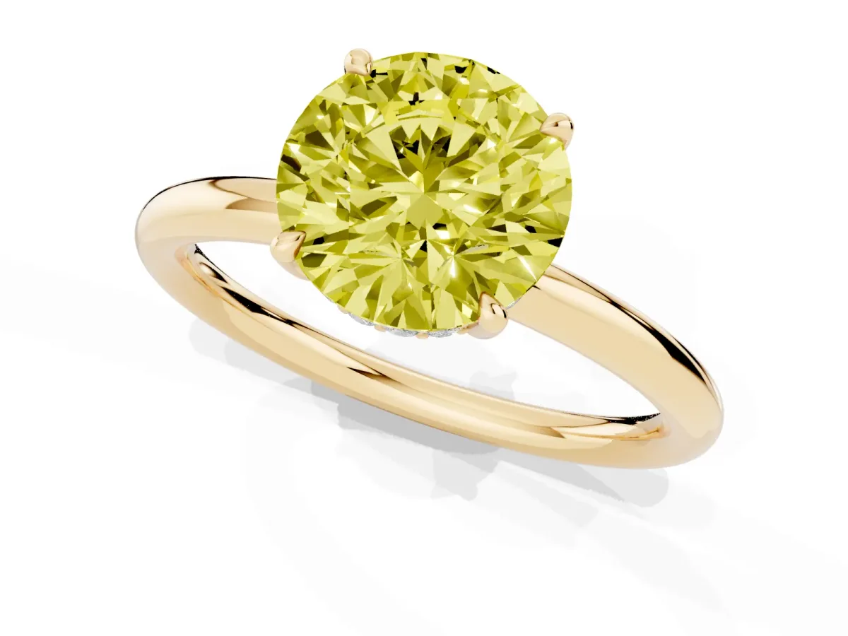 Fancy Yellow Round Cut Diamond Solitaire Ring with Thin Band and Four-Prong Setting Yellow gold