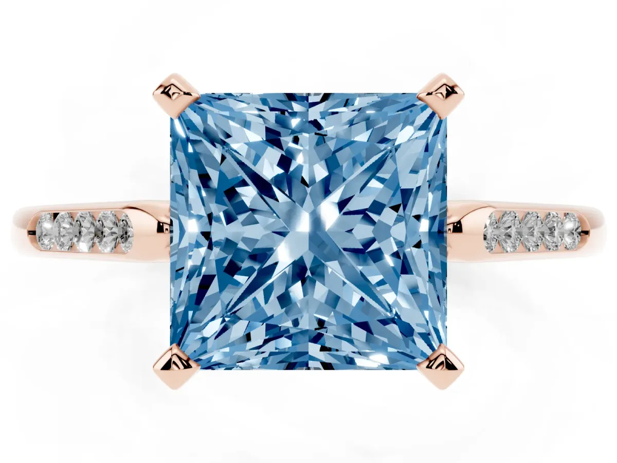 Fancy Blue Princess Cut Diamond Solitaire Ring with Channel Set Round Band and Prong Setting Rose gold