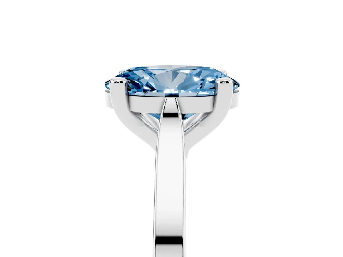Fancy Blue Oval Cut Solitaire Diamond Ring with Four-Prong Setting and Tapered Band Platinum