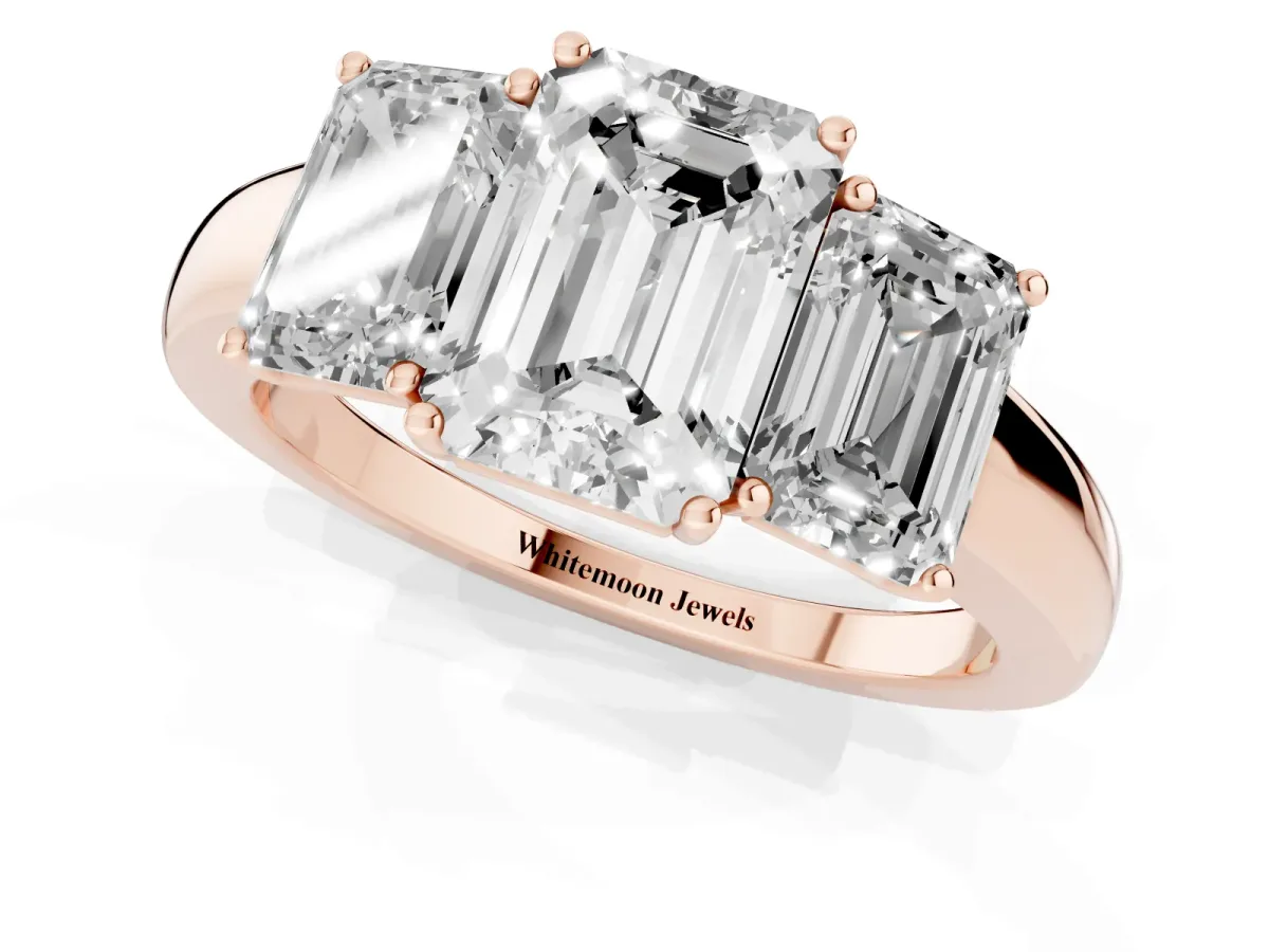 Emerald Cut Diamond Three-Stone Ring with Four-Prong Setting and Classic Band Rose gold
