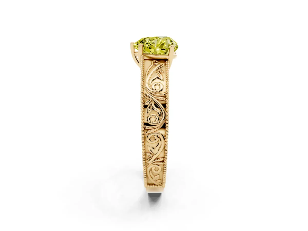 Fancy Yellow Heart Cut Diamond Solitaire Ring with Engraved Band and Four-Prong Setting Yellow gold