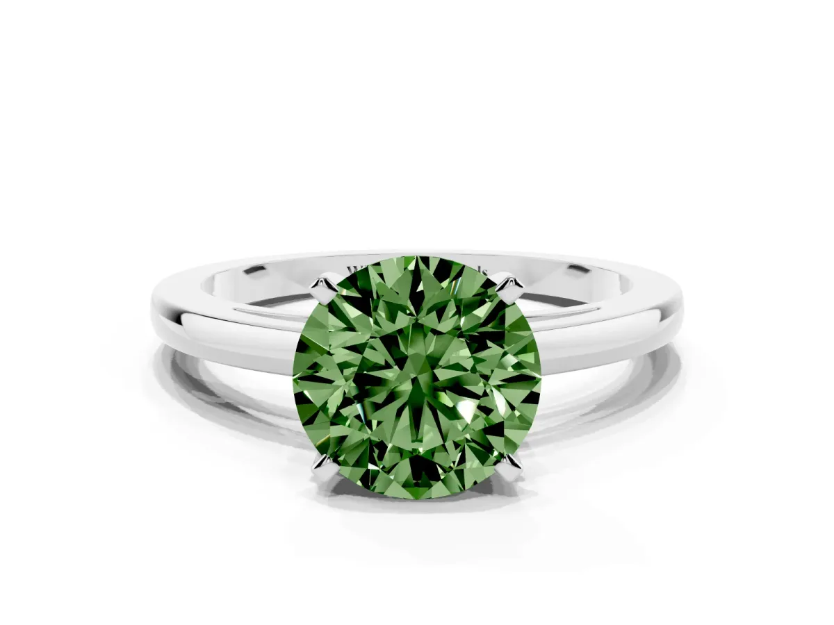 Fancy Green Round Cut Solitaire Diamond Engagement Ring with Four-Prong Setting on a Classic Band Silver