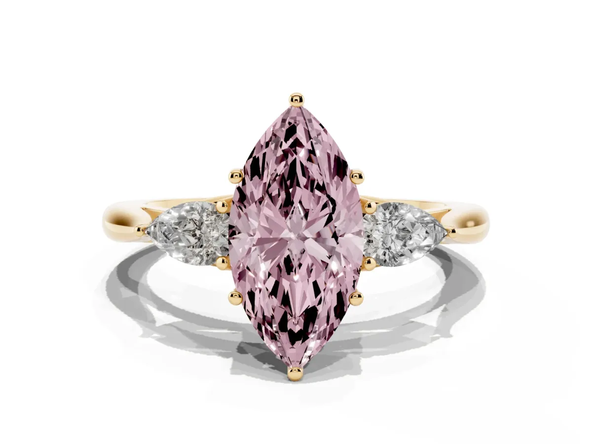Fancy Pink Three-Stone Marquise Cut Brilliant Diamond Solitaire Ring with Tapered Band and Four-Prong Setting Yellow gold