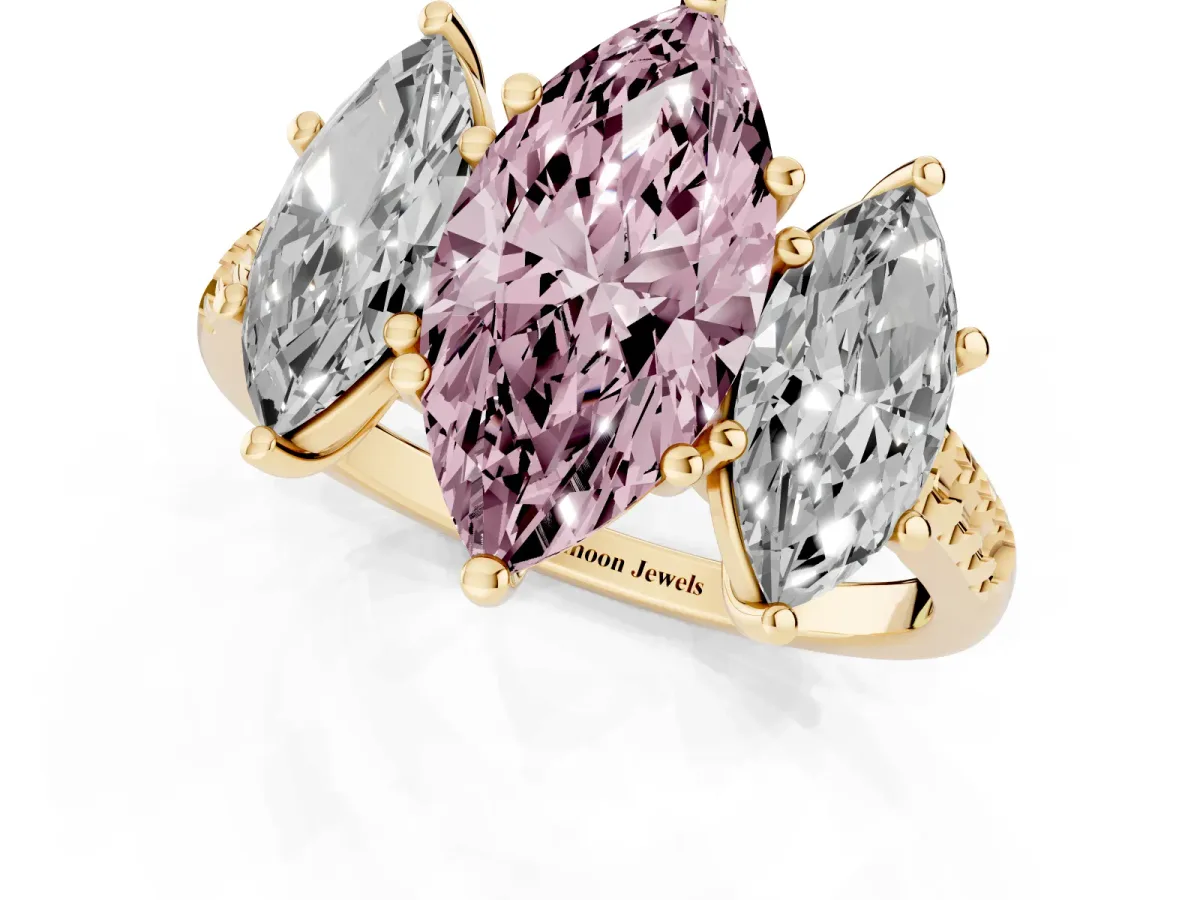 Fancy Pink Three-Stone Marquise Cut Diamond Ring with Round Pavé Band and Prong Setting Yellow gold