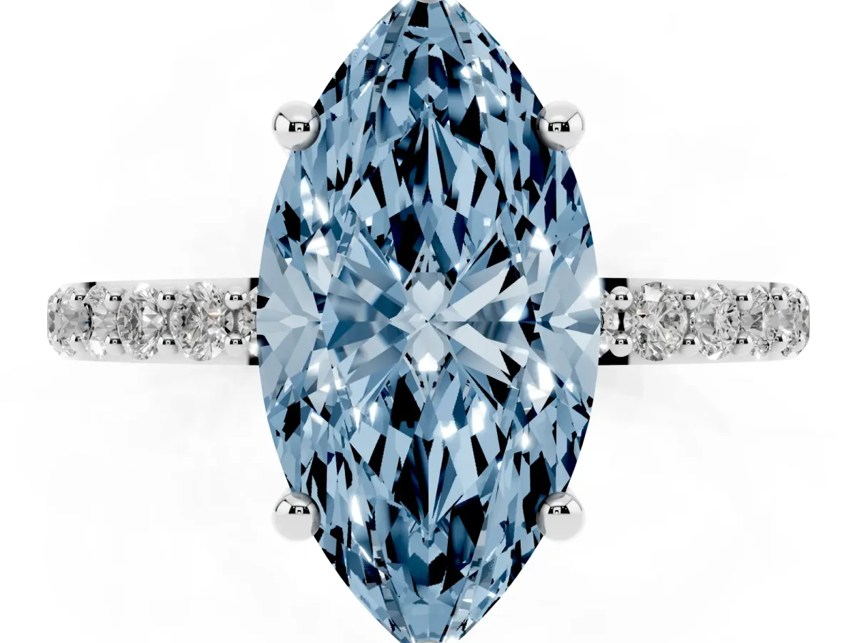 Fancy Blue Marquise Cut Diamond Solitaire Ring with Round Pavé Band and Prong Setting Silver