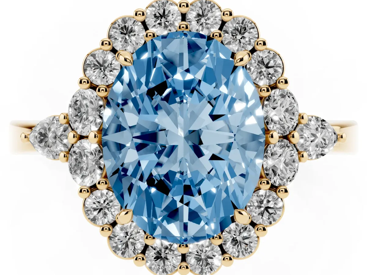 Fancy Blue Oval Cut Diamond Halo Ring with Pear Side Stones and Prong Setting Yellow gold