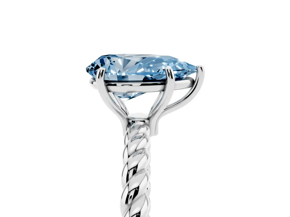 Fancy Blue Pear Cut Solitaire Twist Band Ring with Four-Prong Setting Silver