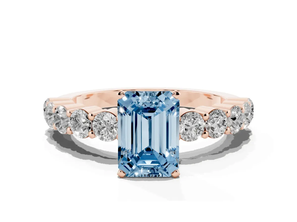 Fancy Blue Emerald Cut Diamond Solitaire Ring with Shared Prong Round Side Stones Rose gold