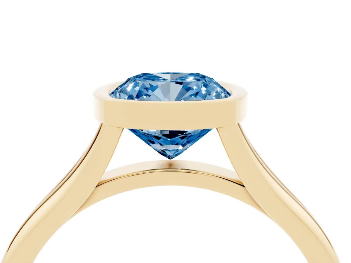 Fancy Blue Bezel Set Cushion Cut Cut Solitaire Ring with Tapered Band Yellow gold