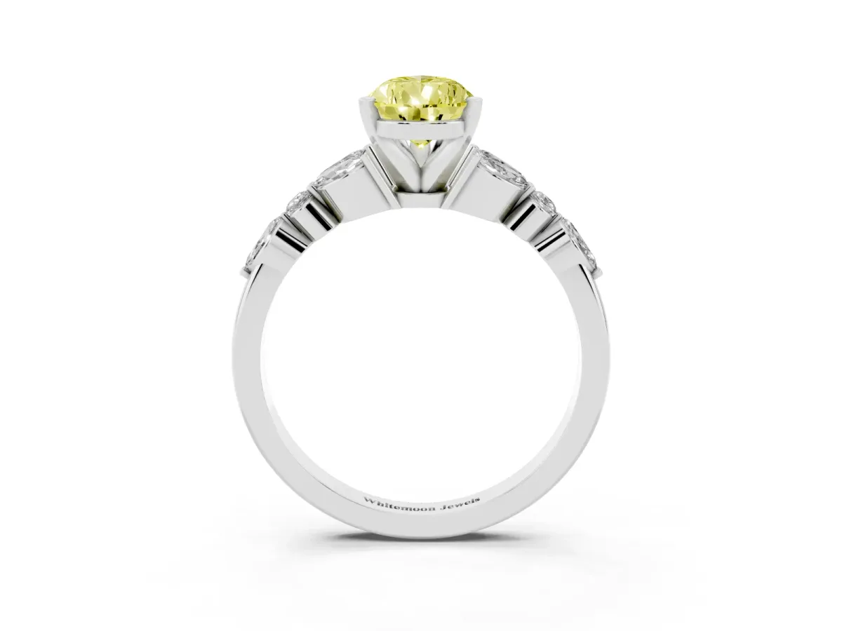 Fancy Yellow Pear Cut Diamond Solitaire Ring with Side Stones and Four-Prong Setting Platinum
