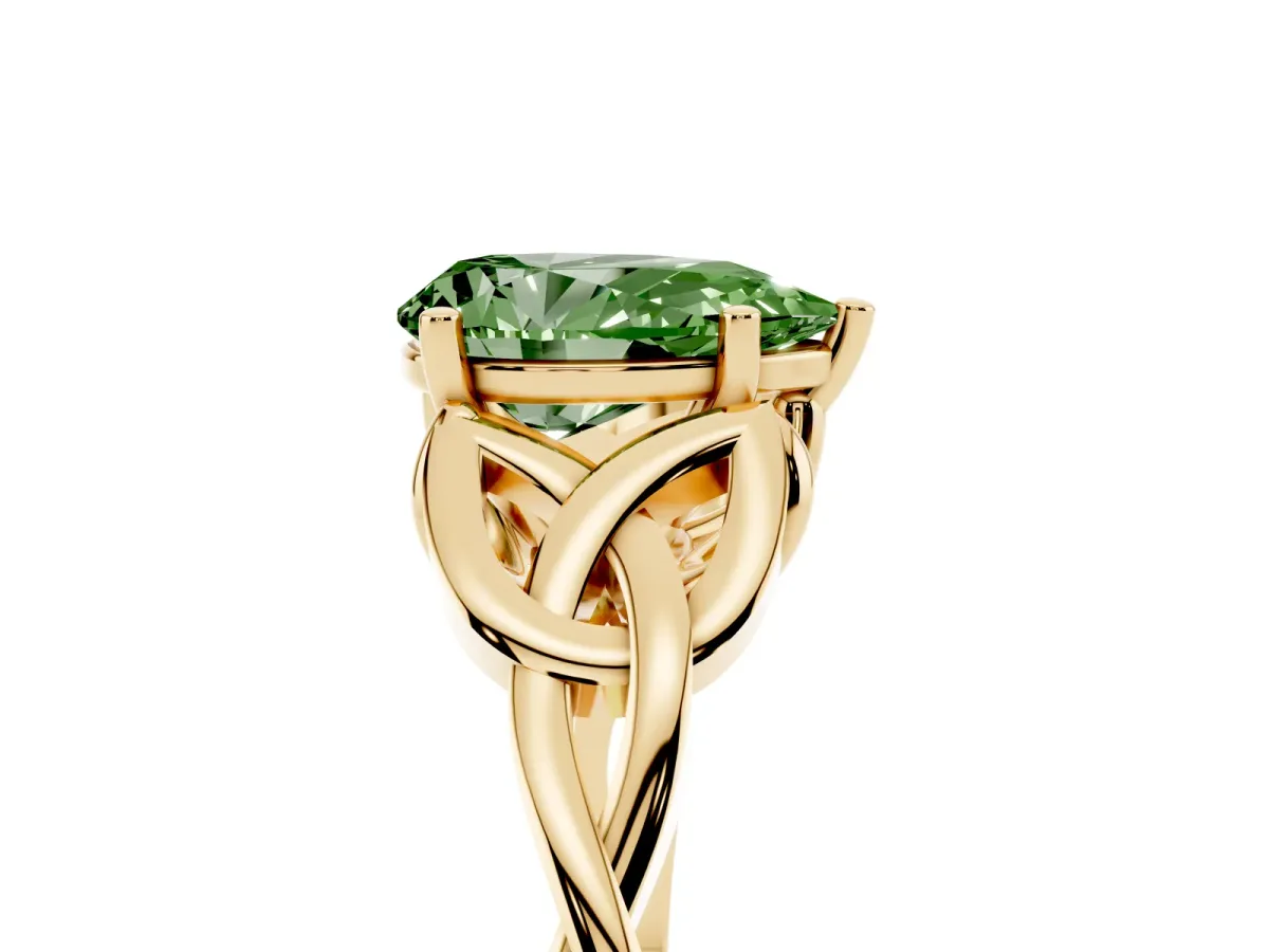 Fancy Green Pear Cut Diamond Solitaire Engagement Ring with Celtic Knot Band and Four-Prong Setting Yellow gold