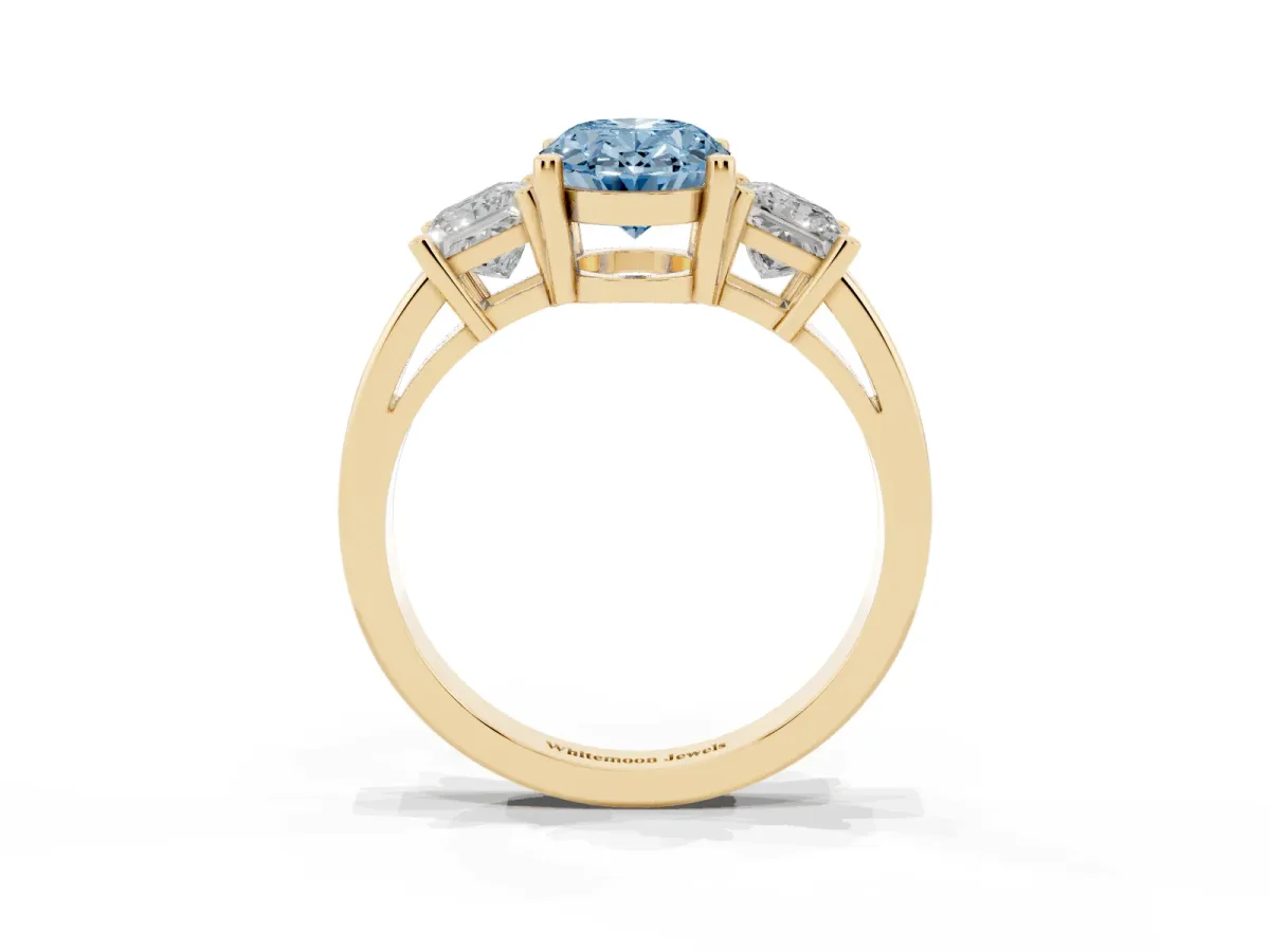 Fancy Blue Three-Stone Oval Cut Cut Solitaire Ring with Prong Setting Yellow gold