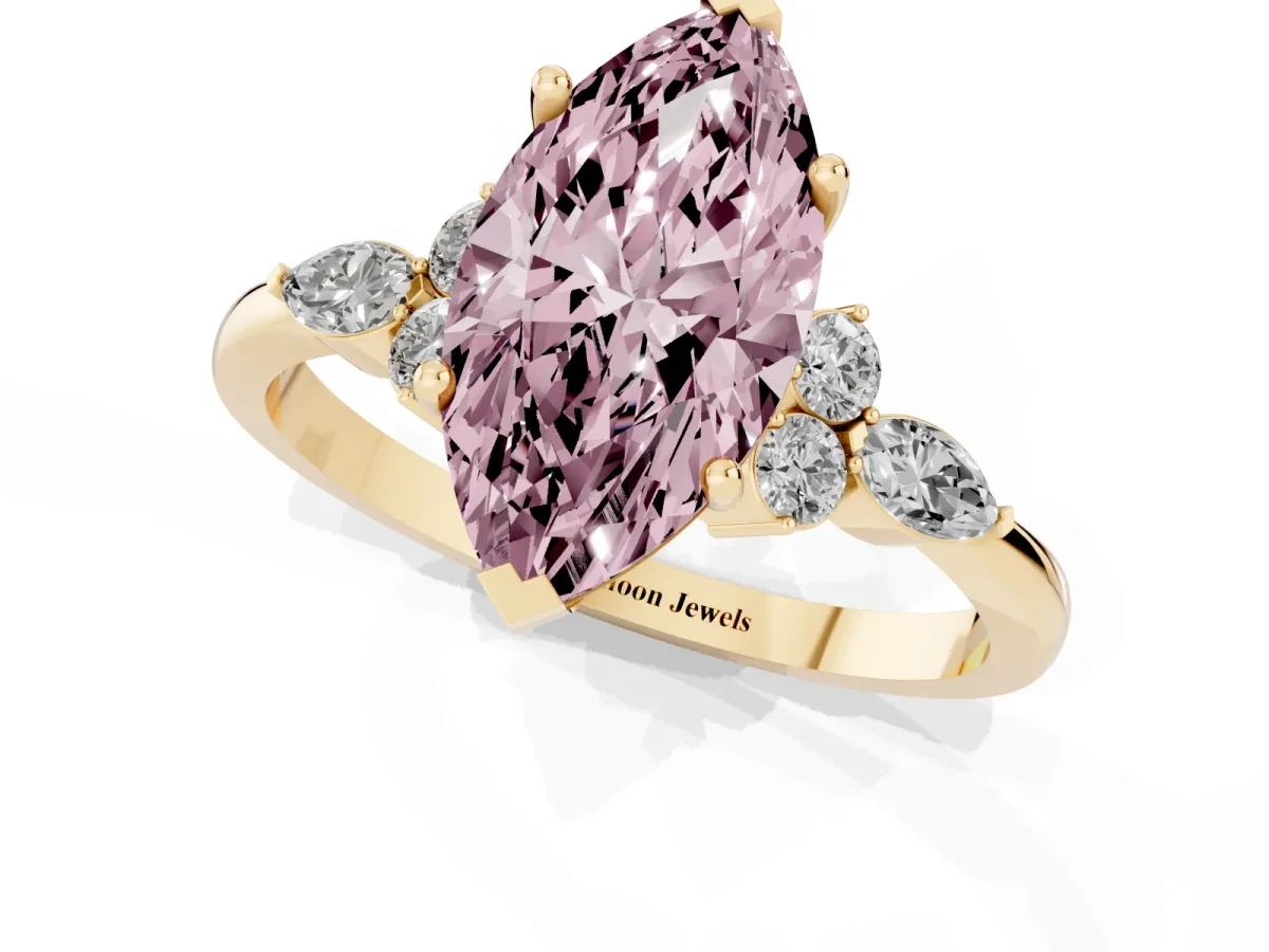 Fancy Pink Marquise Cut Brilliant Diamond Solitaire Ring with Pear Side Stones and Four-Prong Setting Yellow gold